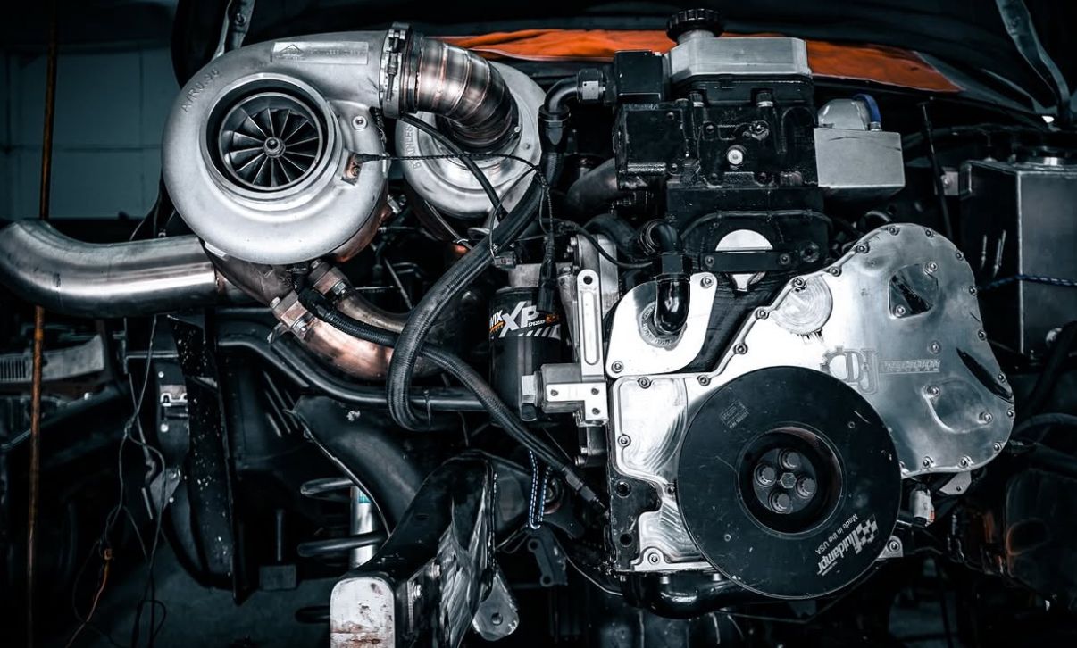 A close up of a car engine with turbochargers.