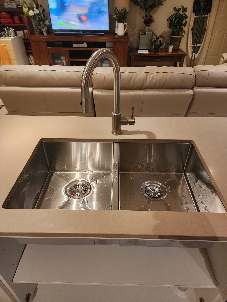 A Stainless Steel Kitchen Sink — RAW Plumbing & Gasfitting In Pearce, ACT