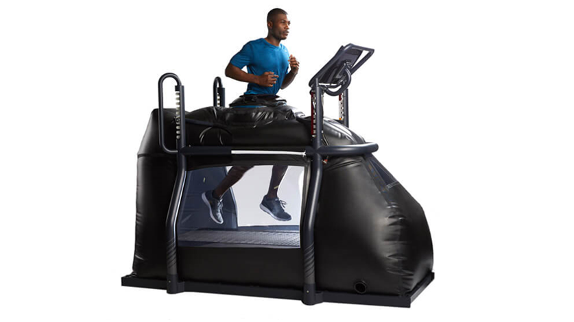 a picture of a mountain in a frame on a gray background .