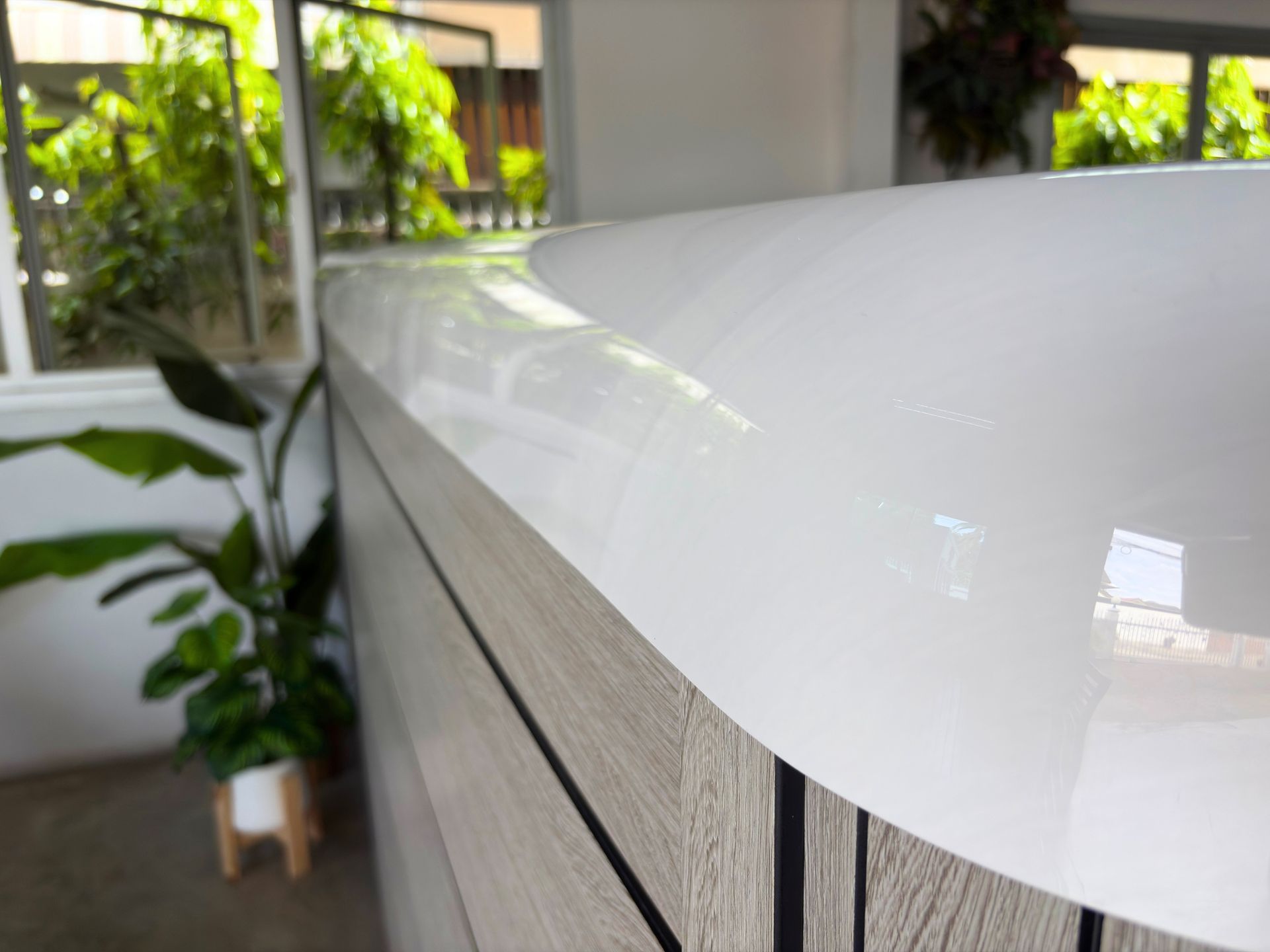 Premium glossy acrylic swim spa surface reinforced with fiberglass, smooth rounded edges, high durability and luxury finish for long-term use in Thailand