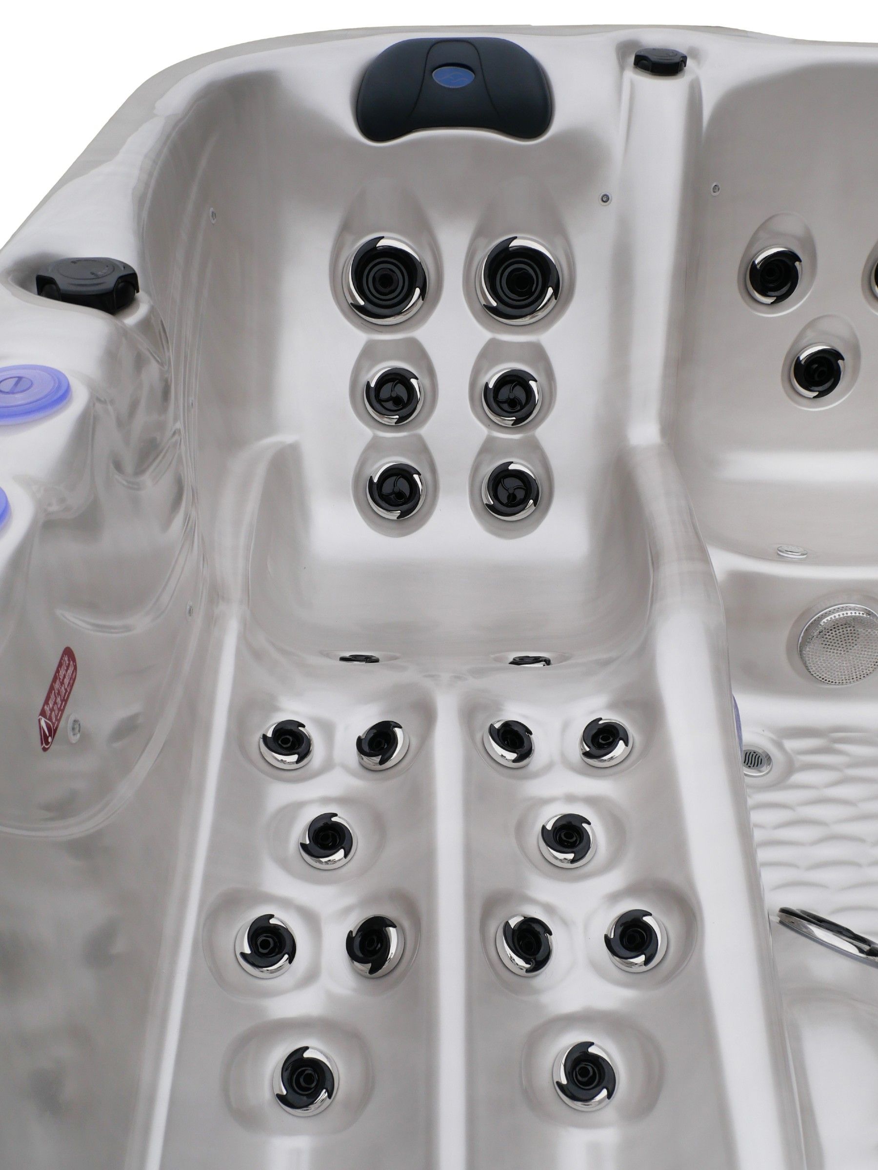 Full body lounger seat in Marina hot tub with ergonomic headrest and multi-level hydrotherapy jets from back to feet