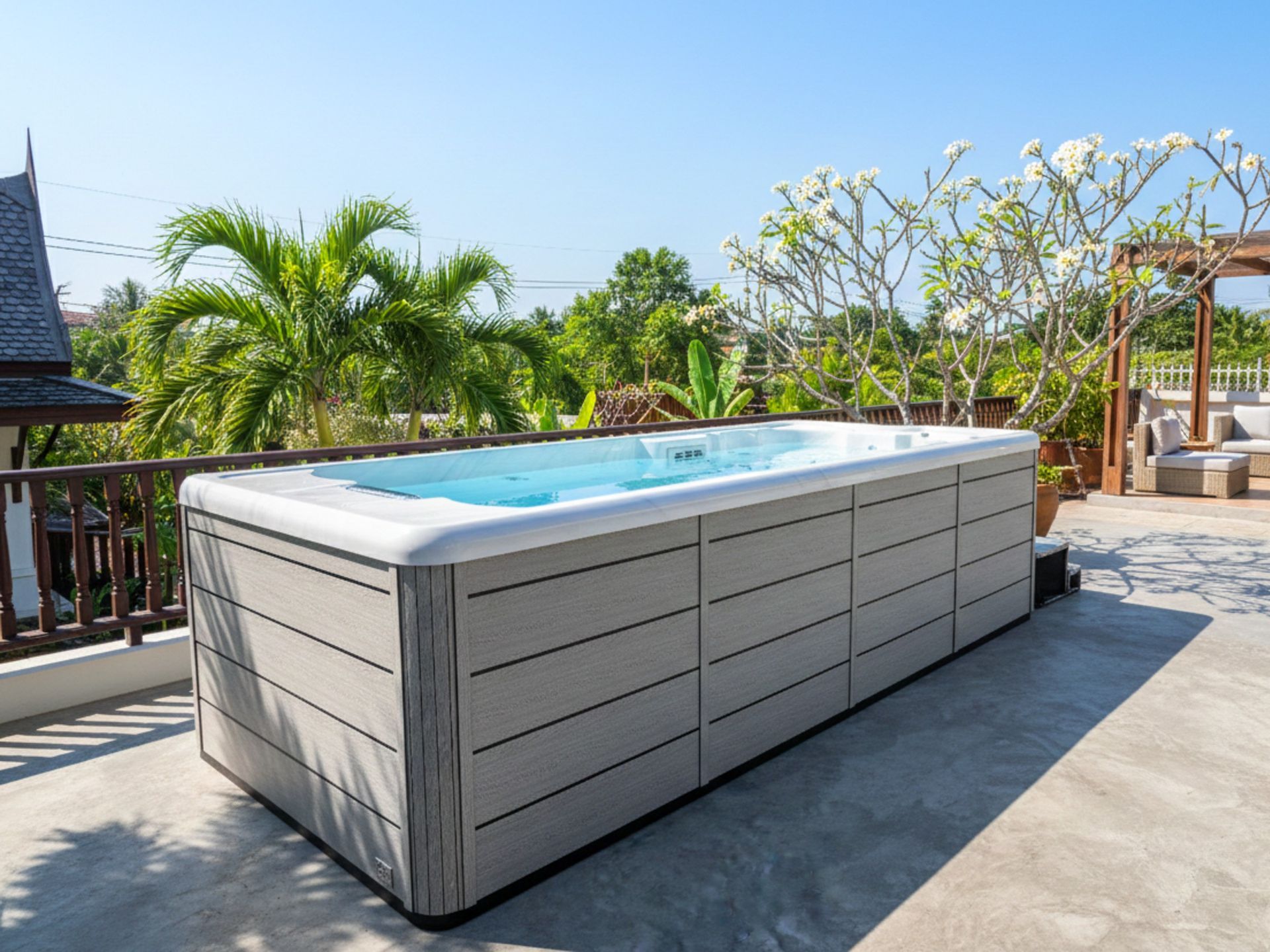 Swim Spa Ultimate 16 small swimming pool installed outdoors at a private home in Thailand