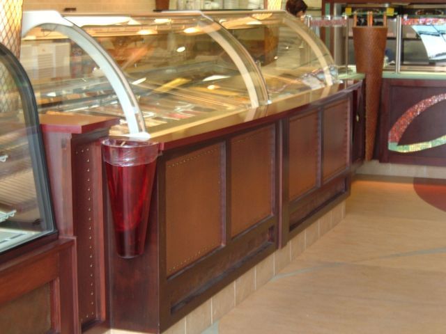 A row of glass display cases in a restaurant