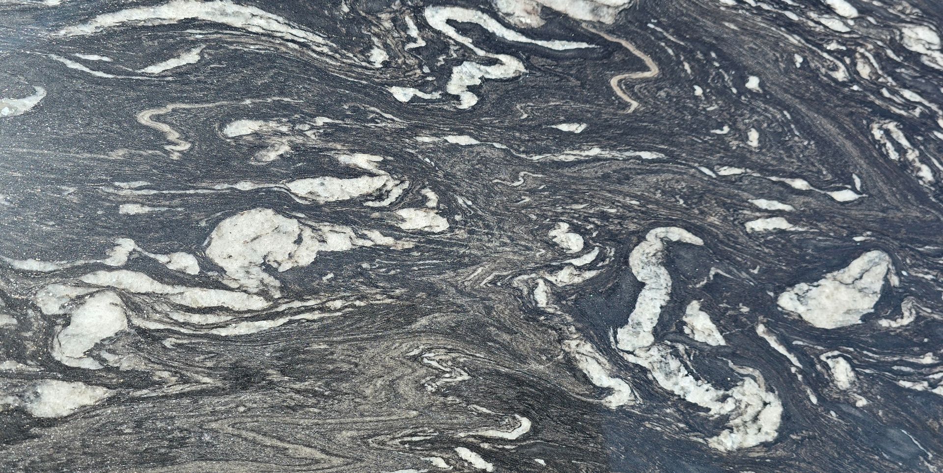 A close up of a black and white marble texture.