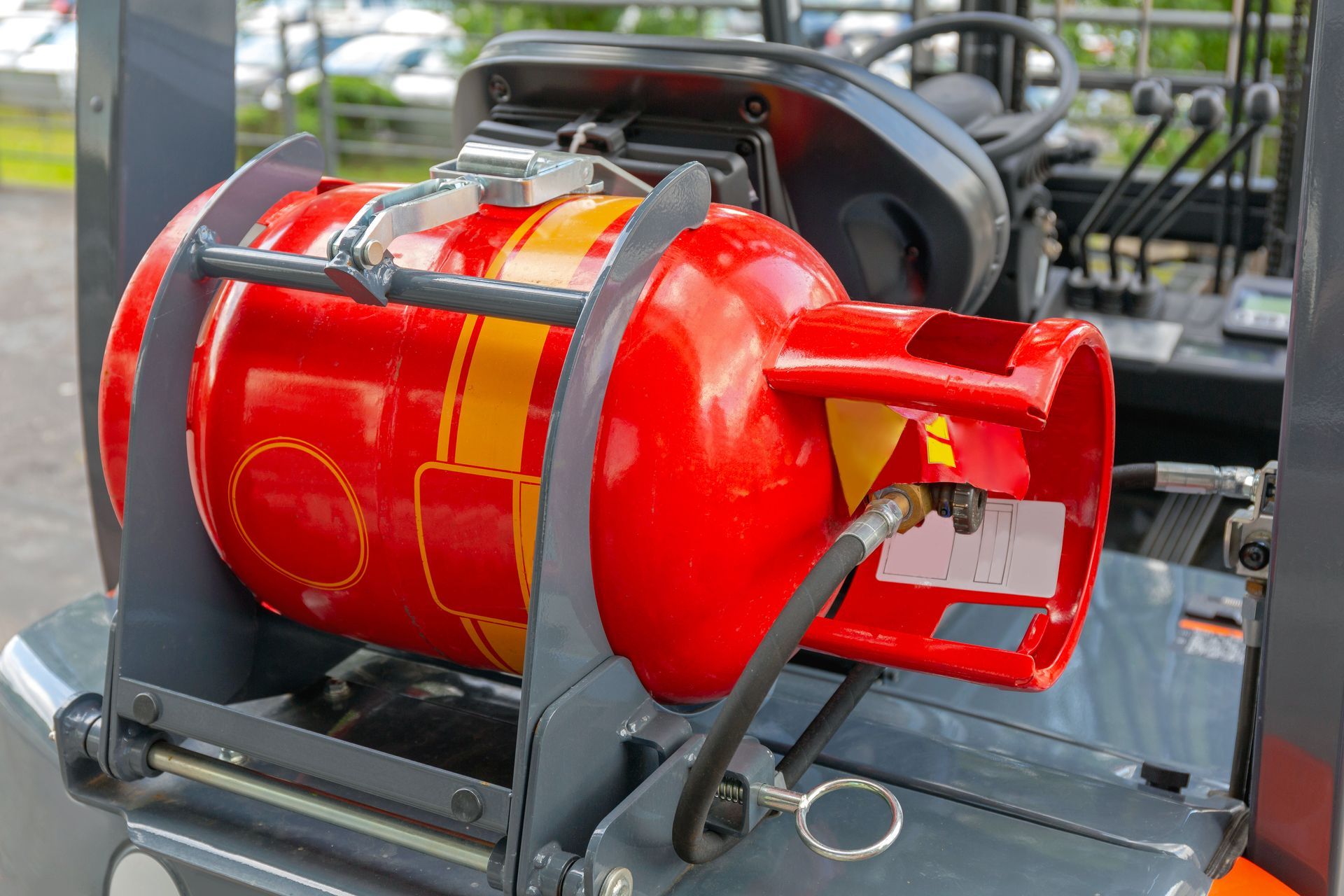 Red Propane Tank Secured on a Forklift — Kuranda Gas & Supplies In Gordonvale, QLD