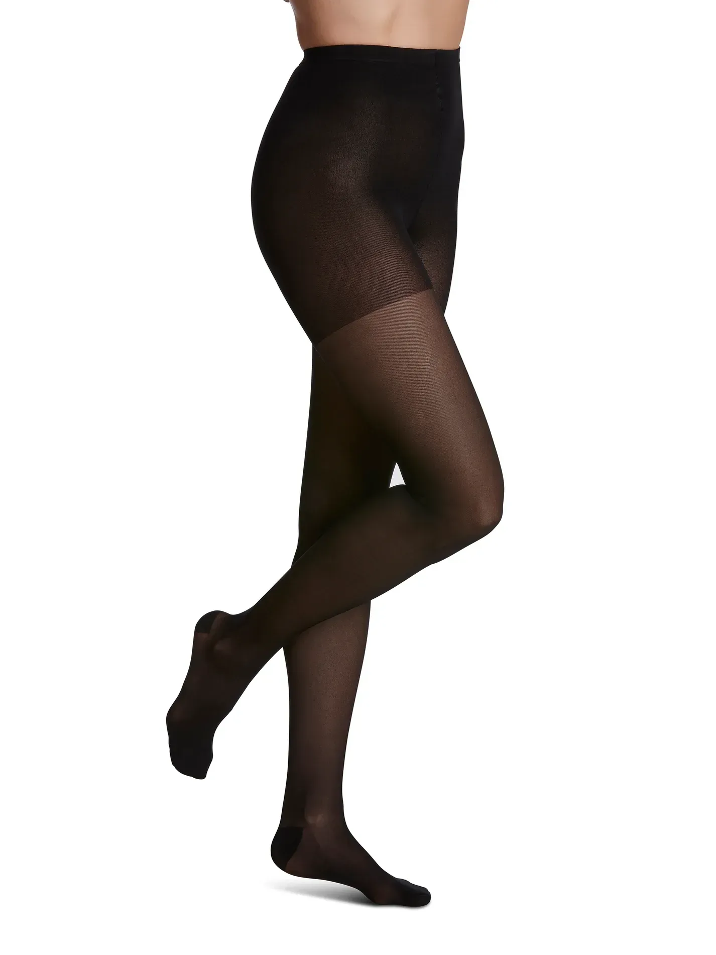 a woman is wearing black tights and black socks .