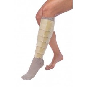 a woman is wearing a bandage on her leg .