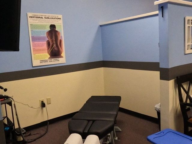 A room with a poster on the wall that says national education