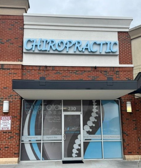 Chiropractor Fixing The Back Of Woman — Acworth, GA — Elite Total Wellness Chiropractor Fixing The Back Of Woman — Acworth, GA — Elite Total Wellness