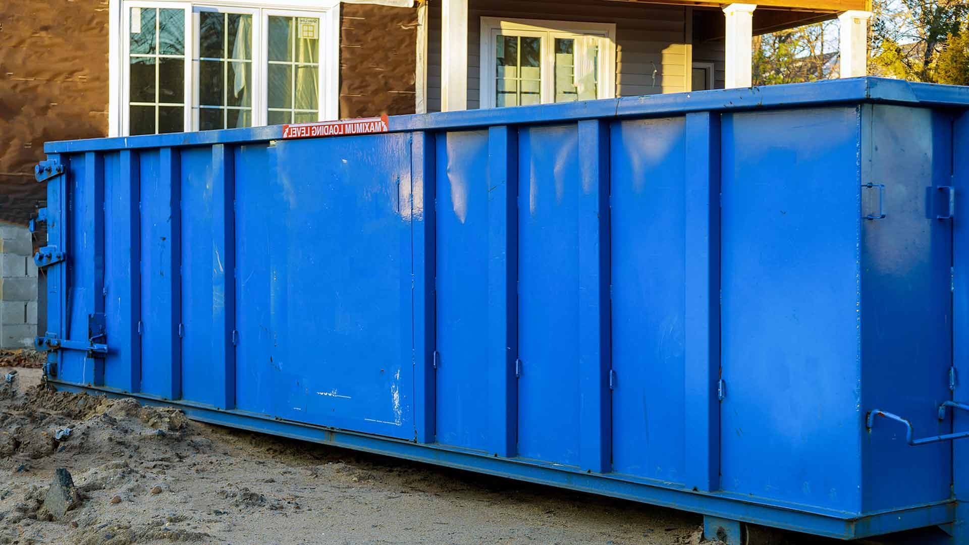 newly rented blue dumpster