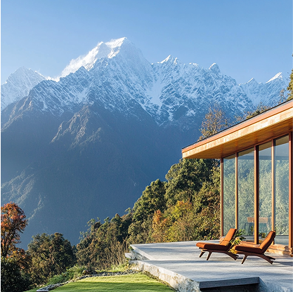 A house with a view of a mountain range