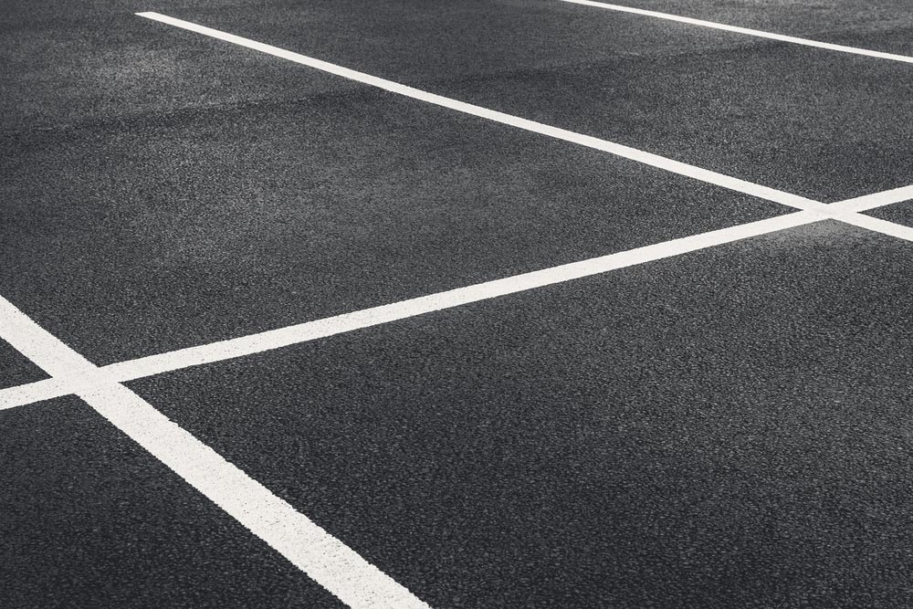 Freshly Repaired And Newly Painted Carpark — Bitumen Services in Darwin, NT