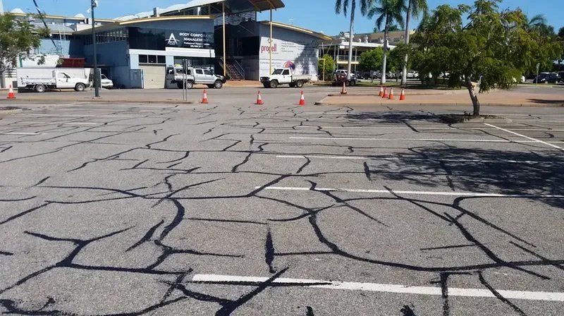 Repairing Parking Lot With Bitumen — Bitumen Services in Darwin, NT