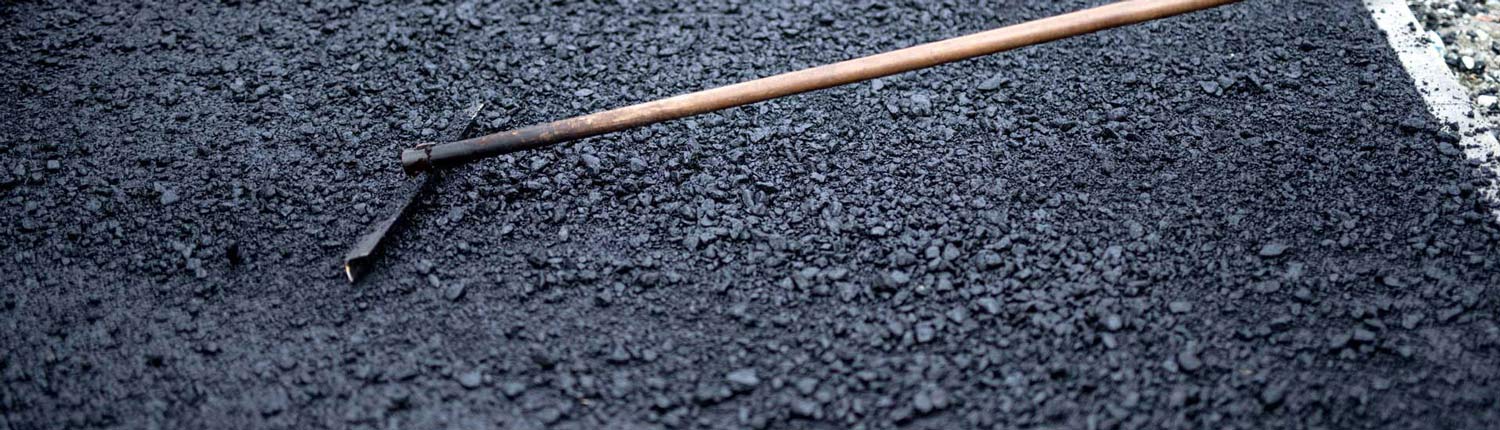 Worker Laying The New Asphalt — Bitumen Services in Darwin, NT