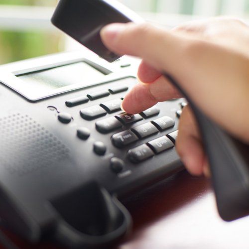 Dialing on the Phone — Jacksonville, FL — The Sod Lot