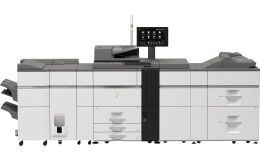 Large industrial color printer with multiple paper trays and a control panel.
