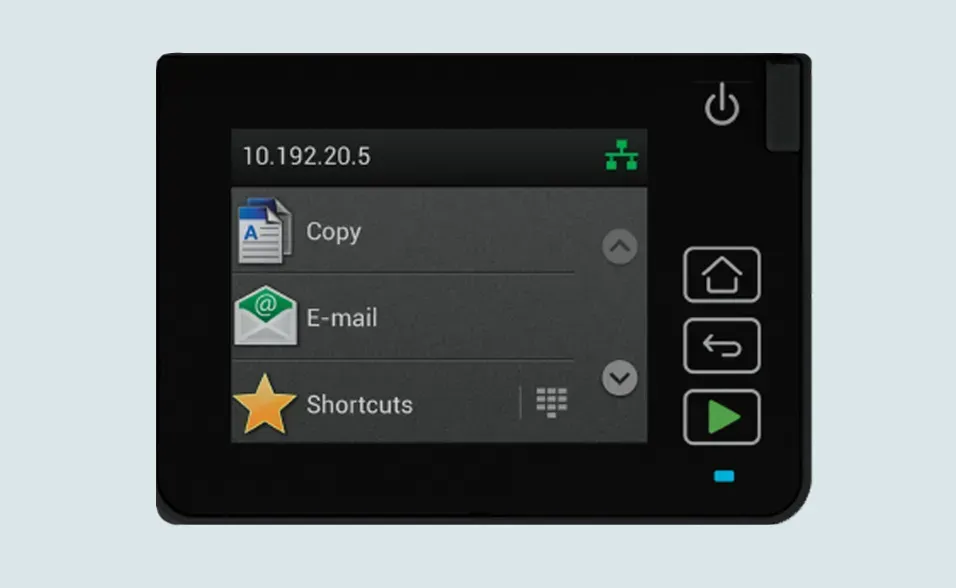 Printer control panel, showing IP address, Copy, Email, and Shortcuts options. Black screen with light background.