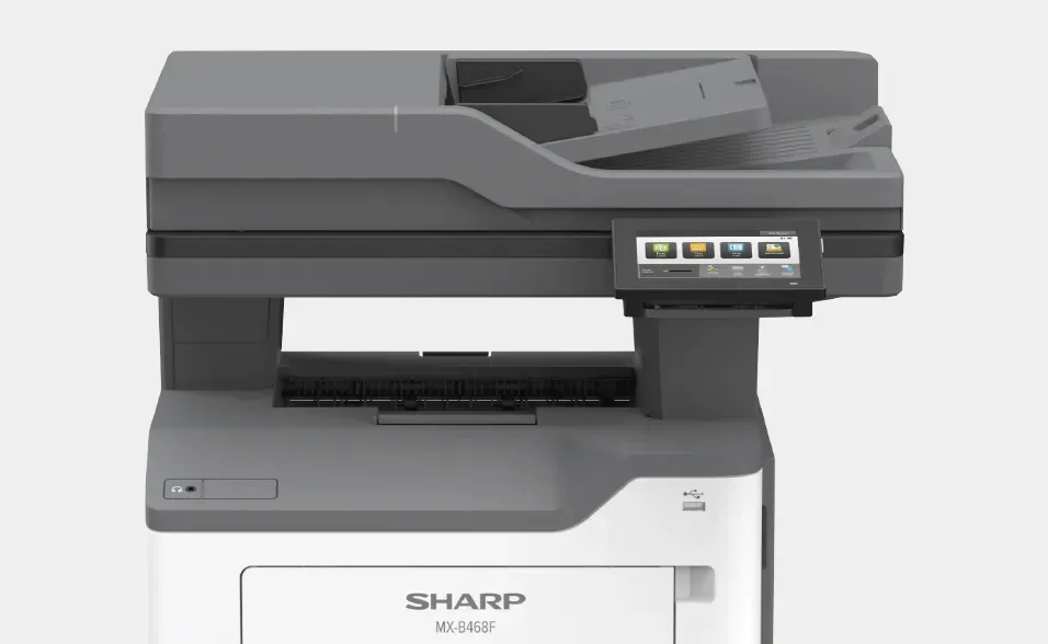 Sharp MX-C306W color multifunction printer. Gray and white, with a touchscreen control panel and document feeder.