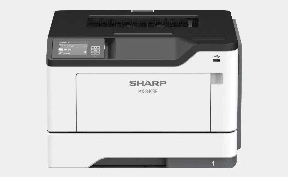 White and black Sharp FX3400 printer. Features a small control panel on the upper left side.