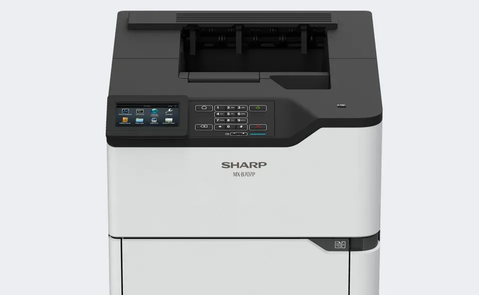 Sharp printer, white and black with touch screen control panel.