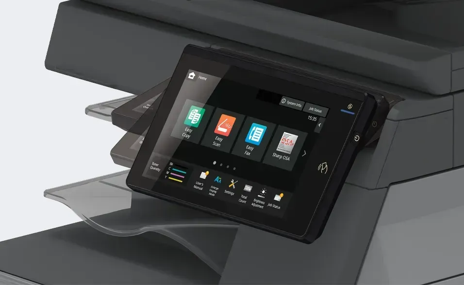 Printer touchscreen: home screen with icons for copy, scan, fax, Sharp DSA.