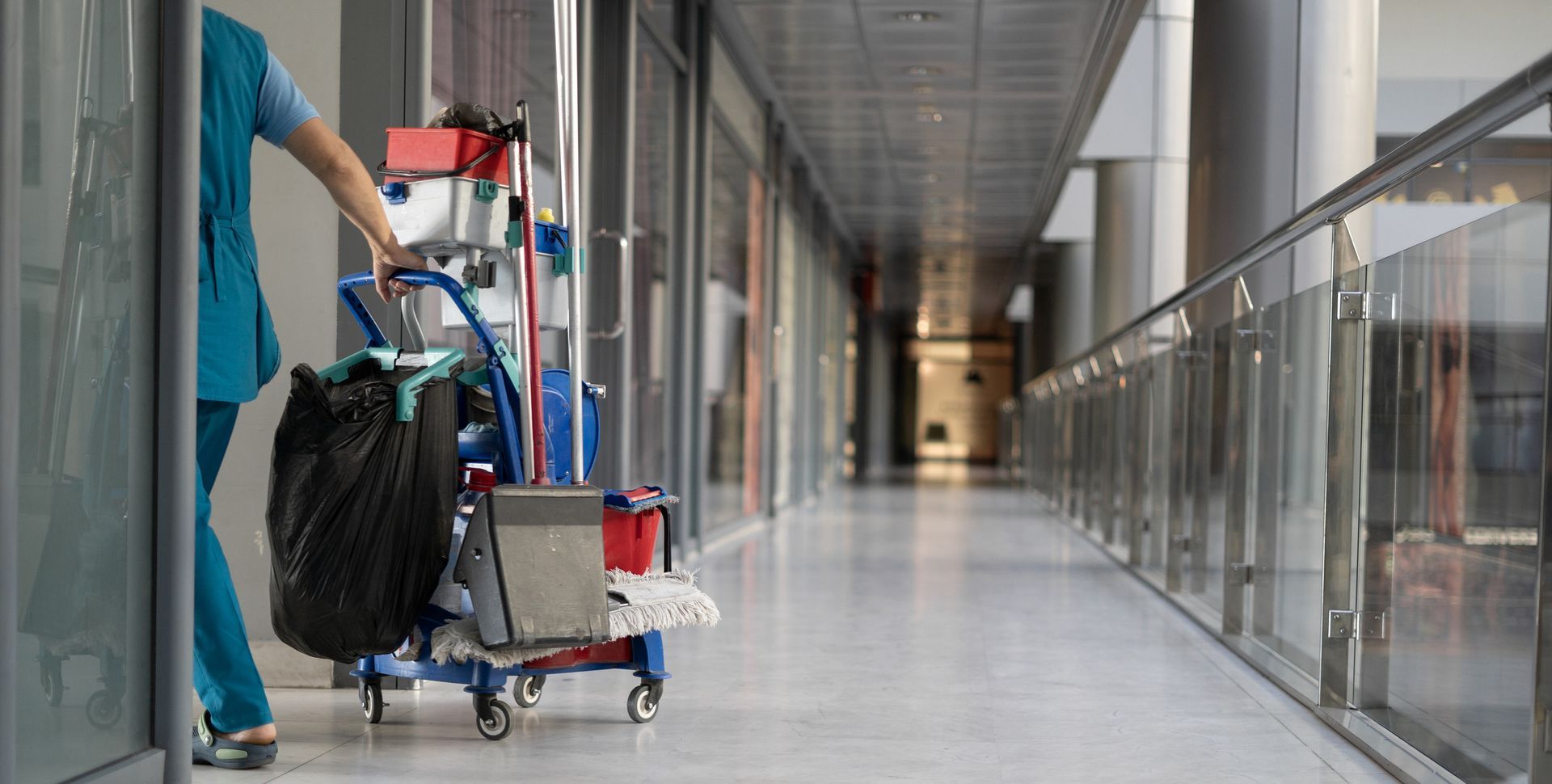 Employee Pulls A Trolley For Cleaning — West Palm Beach, FL — Maid Golden LLC