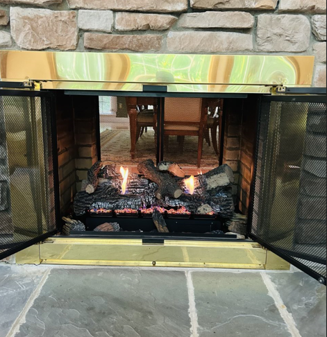 A fireplace with a hole in the middle of it.