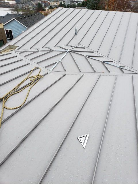 Custom Metal Cricket | Greater Tacoma Area | Tacoma Roofing & Waterproofing