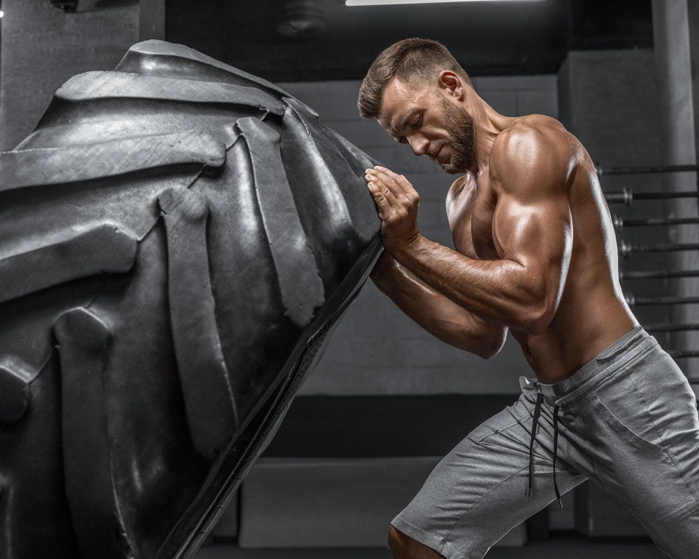 Get In Shape — Muscular Man Working Out in South Zanesville, OH