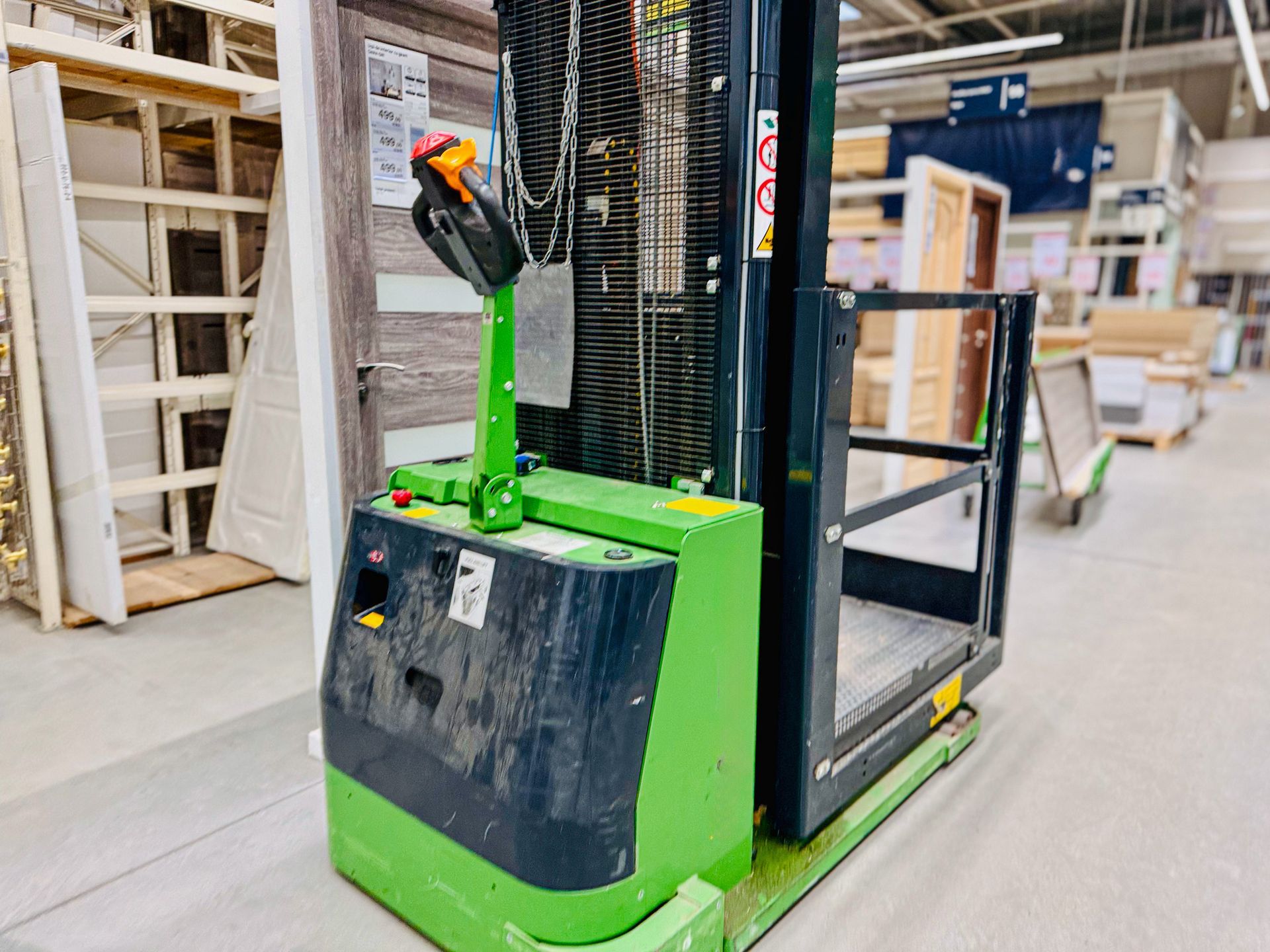 Close-up of a green forklift.