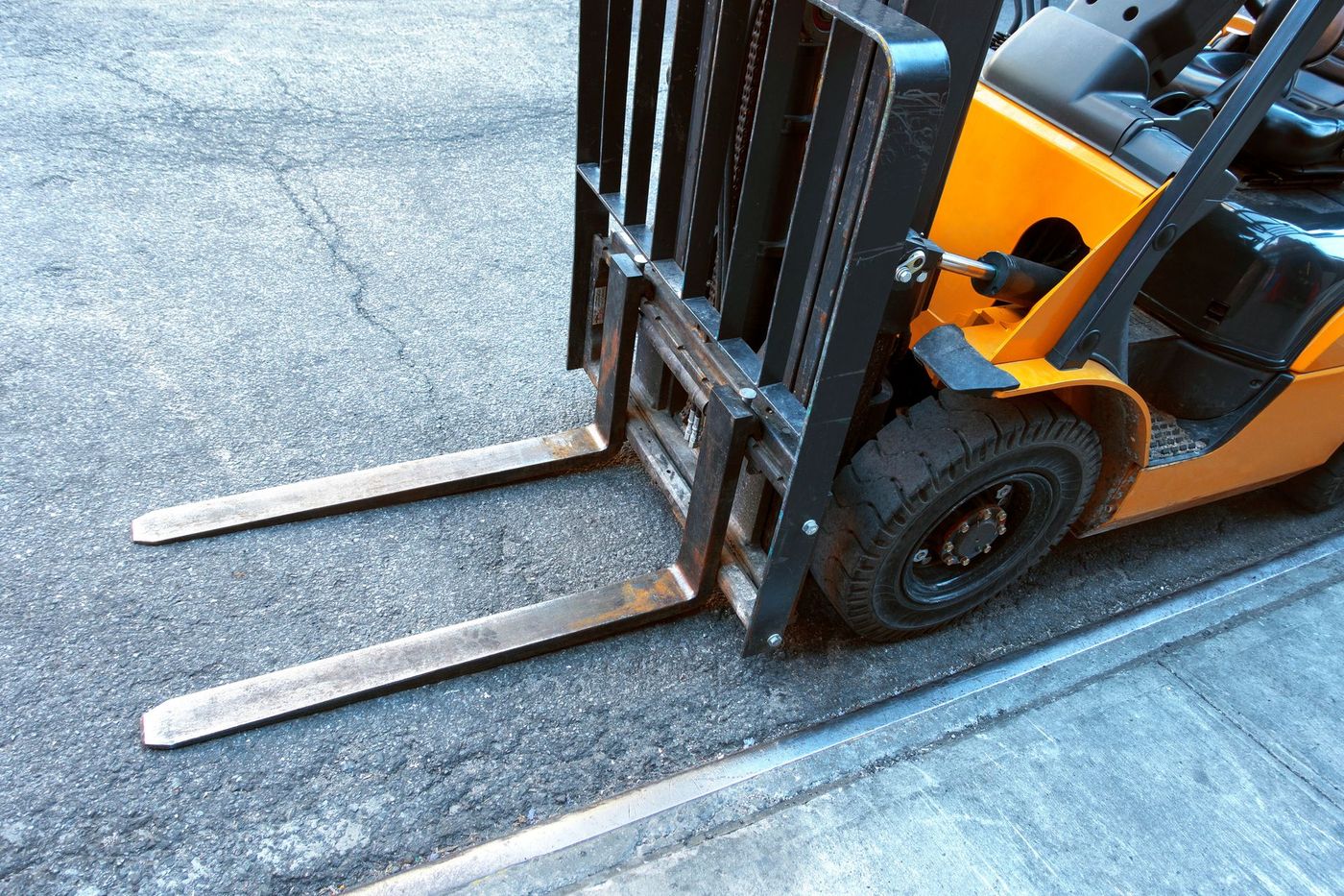 A Yellow Forklift Is Parked on the Side of the Road | Shepperton, VIC | L&P Mackin Forklifts
