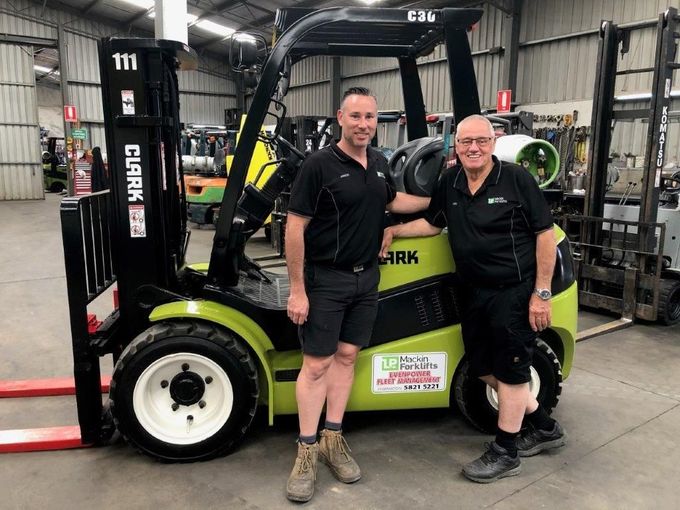 A Yellow Forklift Is Sitting on a White Background | Shepperton, VIC | L&P Mackin Forklifts