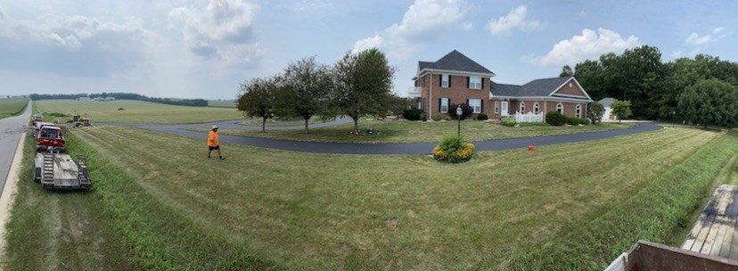 Left Turn Asphalt With House - Cottage Grove, WI - Perla Asphalt Maintenance & Sealcoating