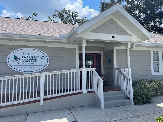 A building with a sign that says the pregnancy center