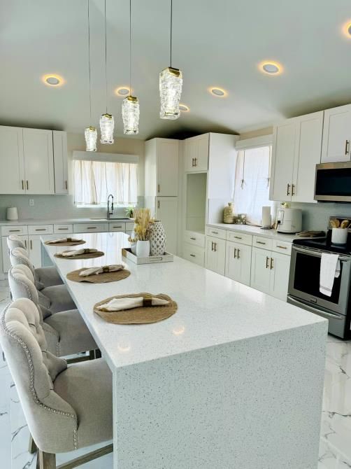 A kitchen with wooden cabinets and stainless steel appliances
