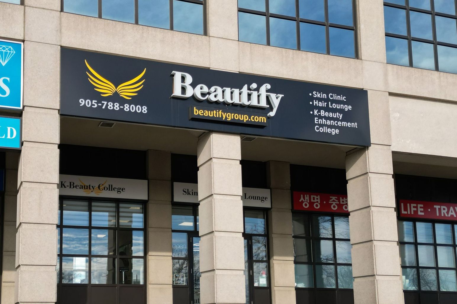 a building with a sign that says beautify on it