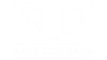 A black and white logo for ray 's tire barn.