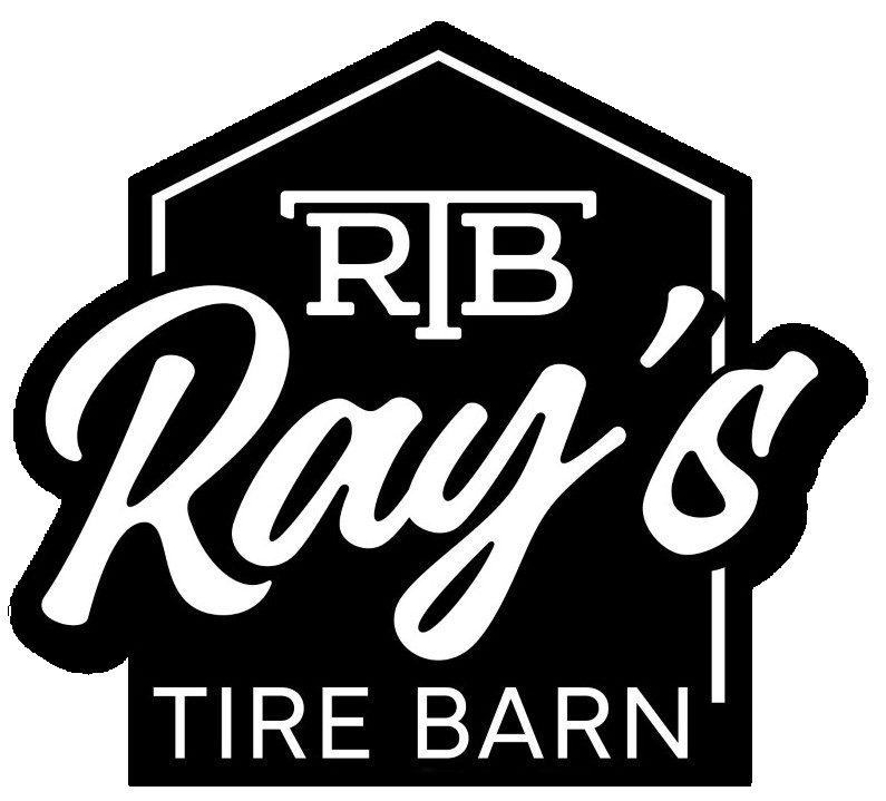 A black and white logo for ray 's tire barn.