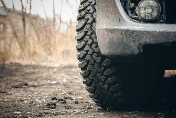 A close up of a row of tires stacked on top of each other.