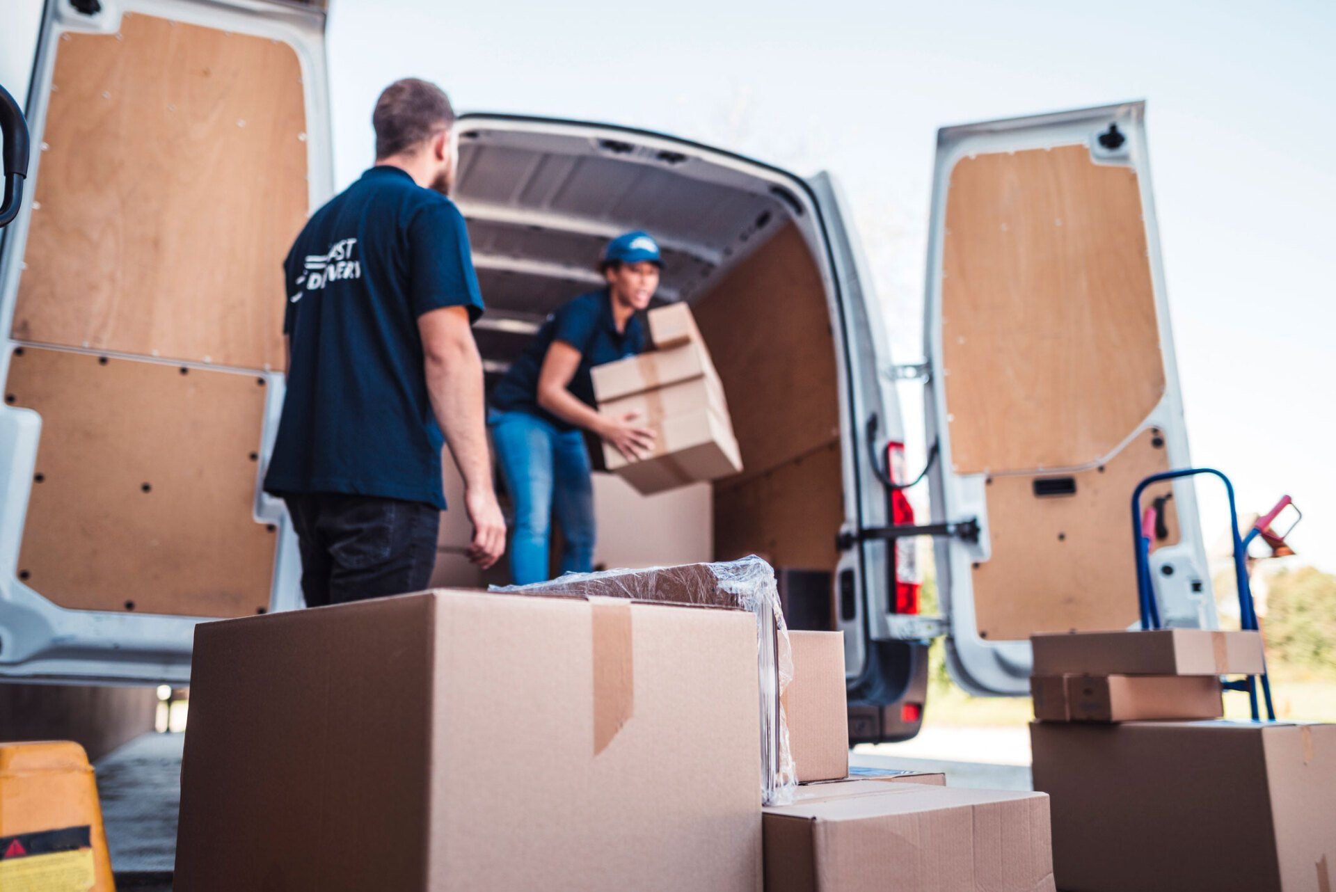 Two Movers Unloading Parcel – Virginia Beach, VA – A Friendly & Affordable Mover