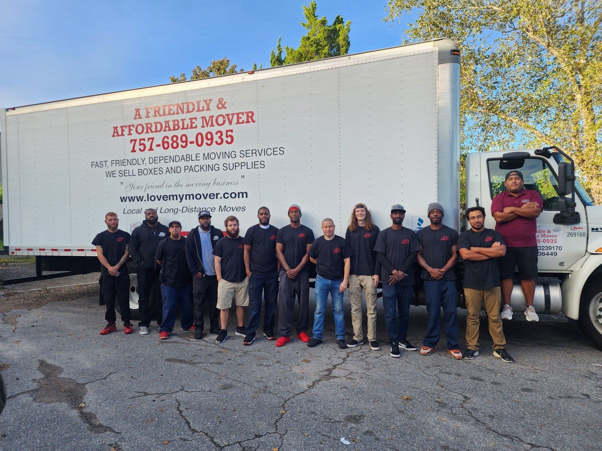 A Group Of People Standing Beside The Truck – Virginia Beach, VA – A Friendly & Affordable Mover