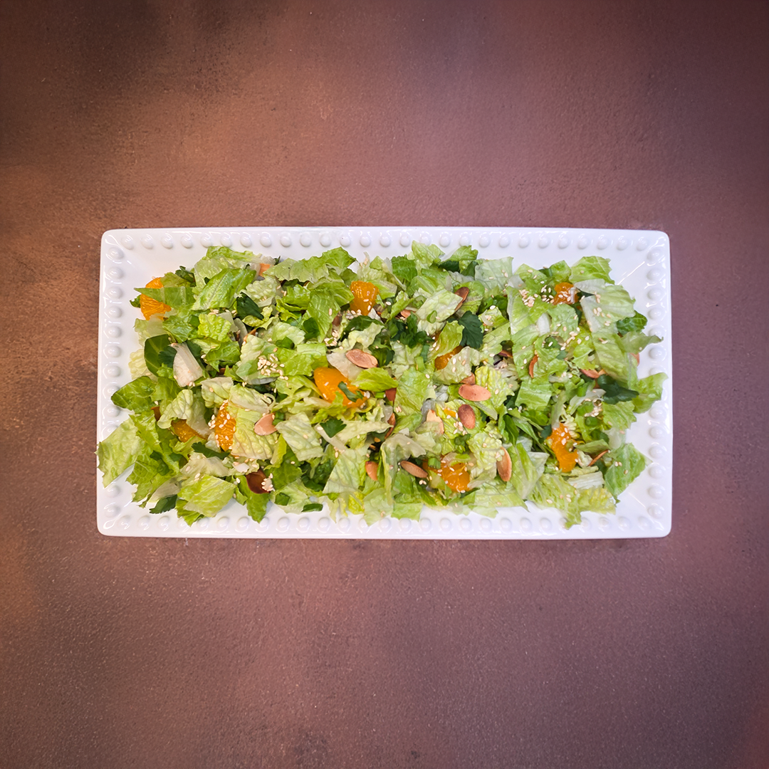 Chez Panise Asian Salad on a white rectangular plate