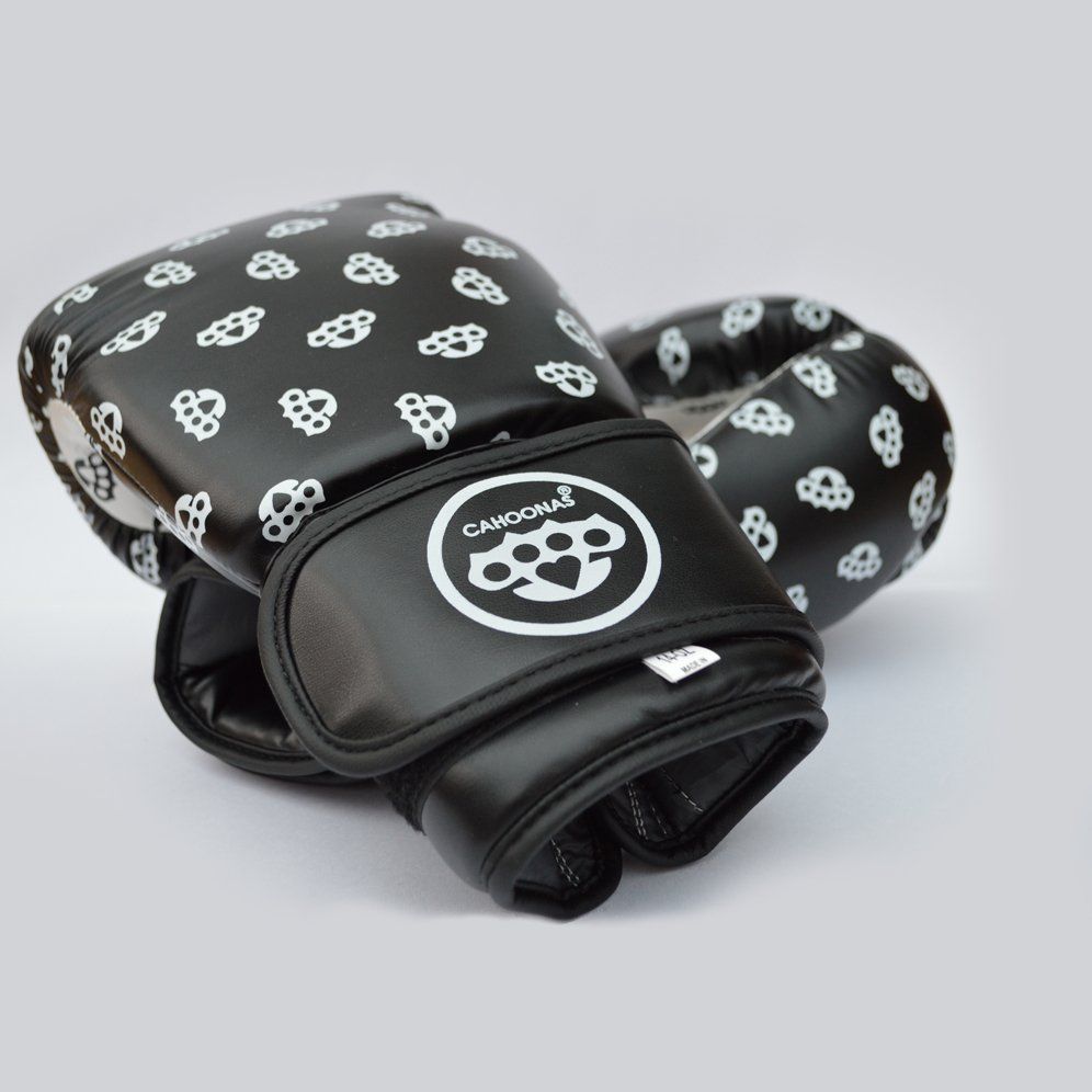 Image shows a black and white pair of boxing gloves with a repeat pattern featuring a knuckle duster motif