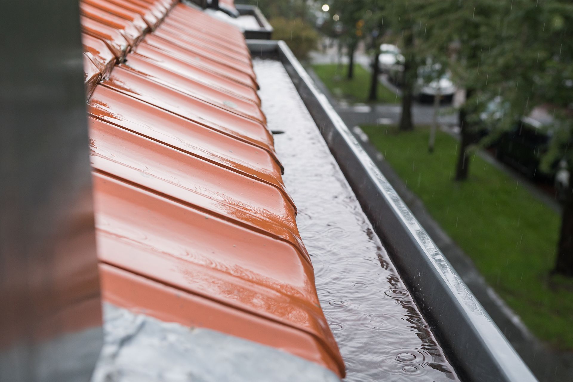 Rain Flowing Through the Gutter