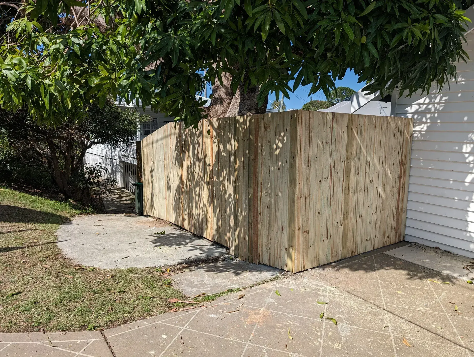 A Wooden Corner Fence Under a Tree — Tuff Fencing in Caboolture, QLD