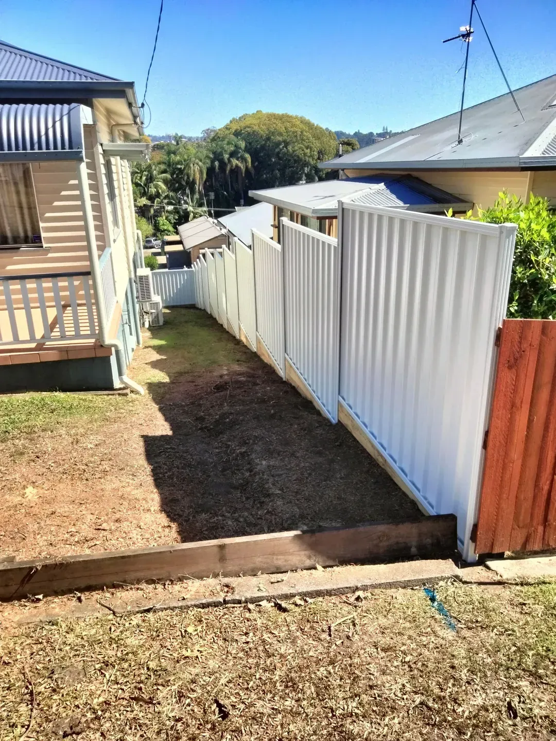 A Metal Fence in Front Yard of Old House— Tuff Fencing in Caboolture, QLD