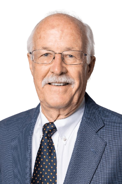 Portrait of a smiling man in glasses, wearing a blue suit and patterned tie on a white background