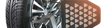 Image of tires being aligned | American Five Star Auto Repair & Transmission