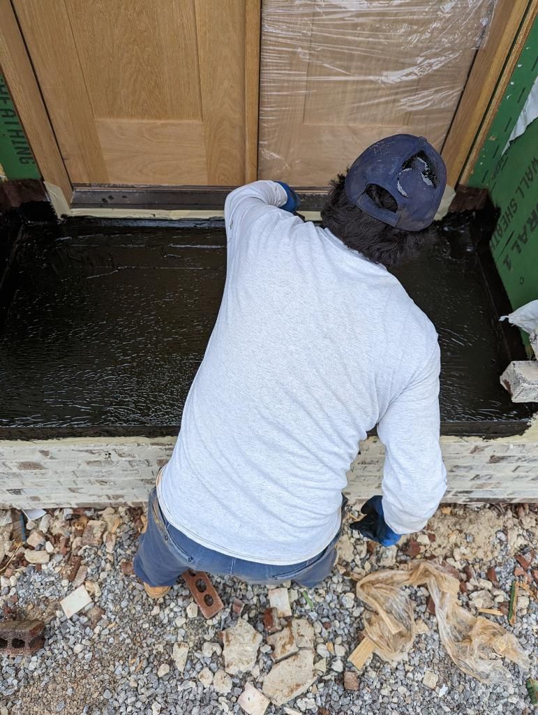 Man working on waterproofing