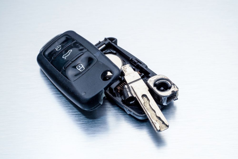 A Car Key With Its Case Removed is Sitting on a Table — The Skeleton Key Locksmiths & Security in West Tamworth, NSW